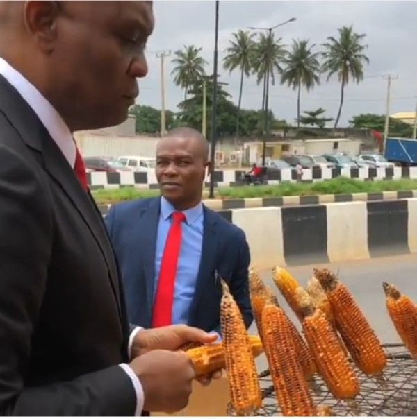 Wizkid Reacts As Billionaire Tony Elumelu Sampling Roasted Corn In Lagos 11